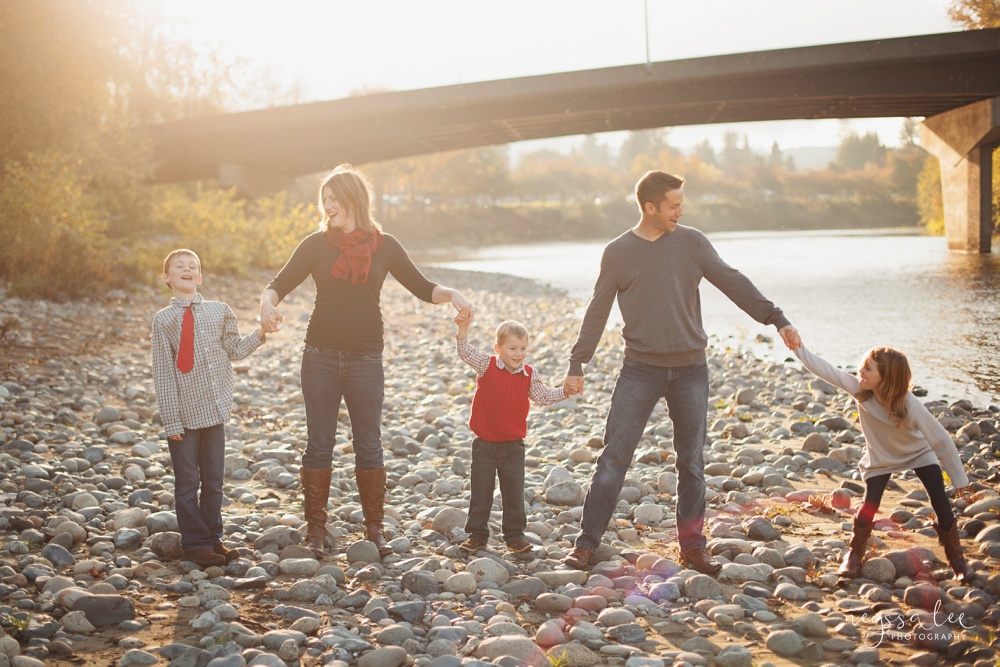 dancing in the sunshine, family photography, family photo by the river