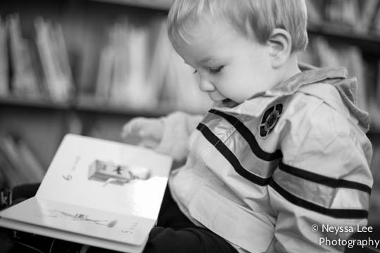 photos in the library, snoqualmie library, toddler boy reading book