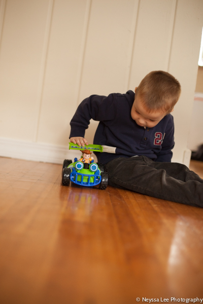 Photo tips for photographing a favorite toy, Toddler boy with toy car