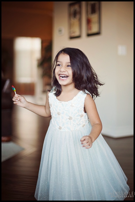 Preschool Girl spinning in pretty dress