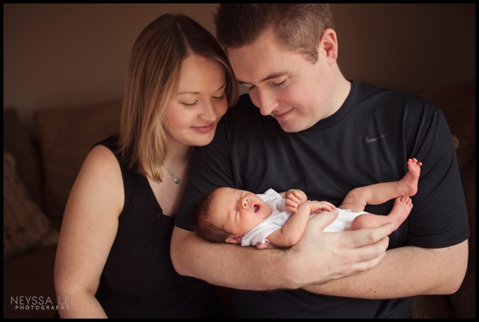 Family with newborn baby during Seattle newborn photo session.