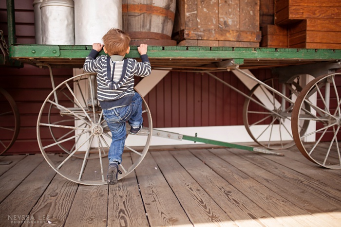 Photos of Brotherly Love, Preschool boy climbing, wagon used in photo