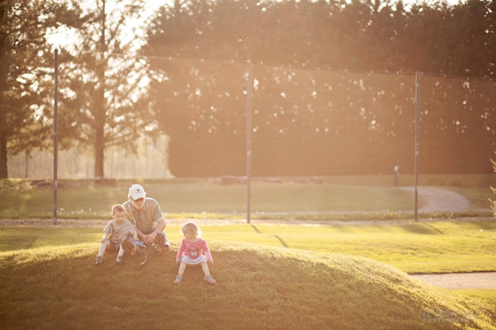 Backlit image, kids with grandpa, Golf course