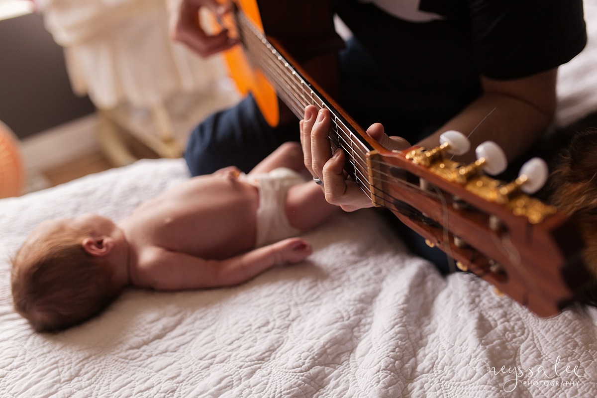 Dad playing guitar to newborn baby girl, Family of 5, newborn baby girl, Snoqualmie Newborn Photographer