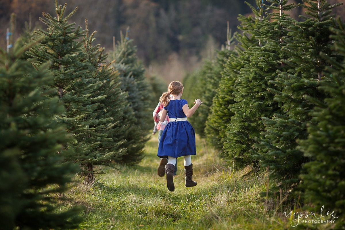 Family Photos at a Christmas Tree farm, Neyssa Lee Photography, Snoqualmie Photographer, Seattle Family Photography, girl runs in tree farm