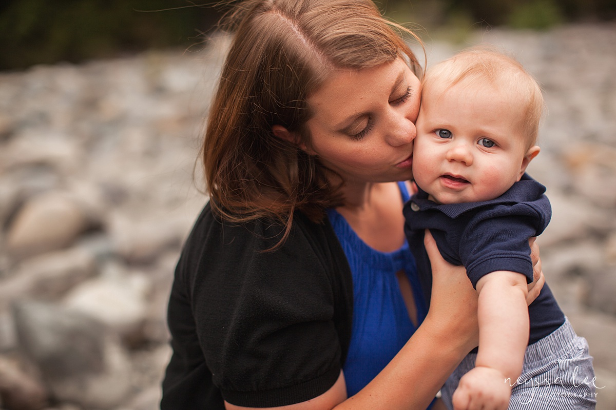 Snoqualmie family photographer, Neyssa Lee Photography, toddler only wants to play during photos, mom kisses baby boy