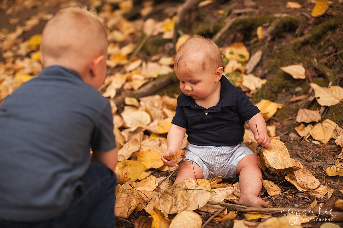 Snoqualmie family photographer, Neyssa Lee Photography, toddler only wants to play during photos, brothers in fall leaves