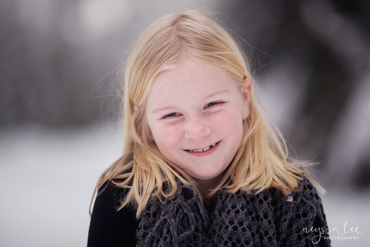 Neyssa Lee Photography, Snoqualmie Family Photographer, Family photos in the snow, Girl smiling in the snow