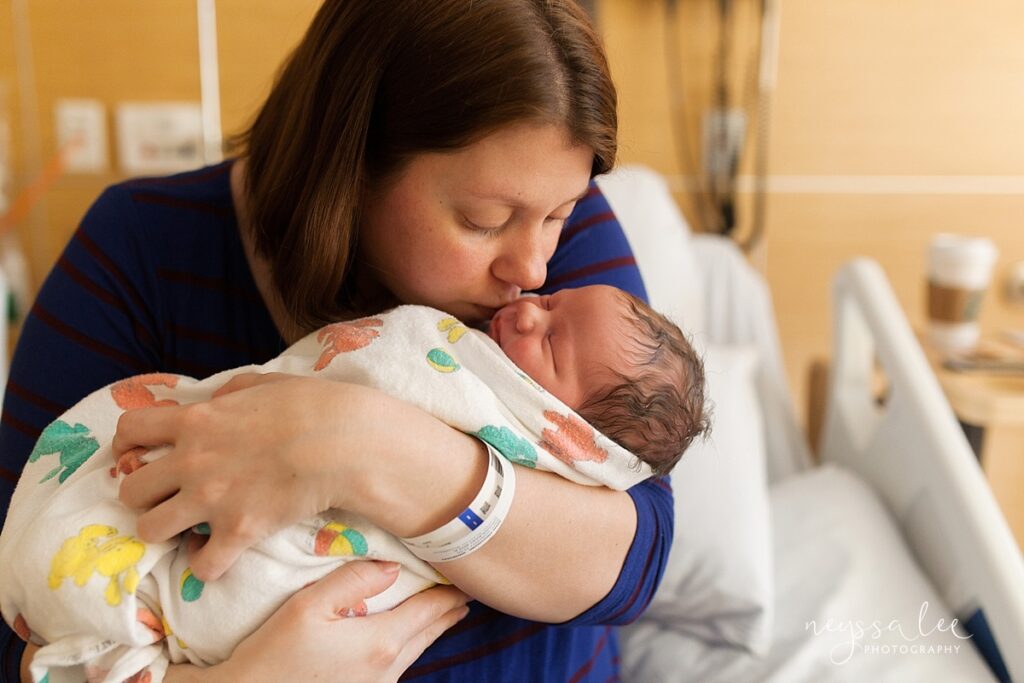 Hospital portraits of newborn baby and mother