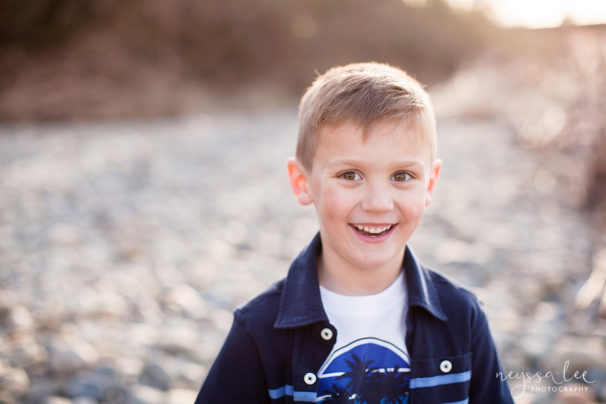 Family Photos by the River at Sunset, Neyssa Lee Photography, Snoqualmie Family Photography, Portrait of a boy with beautiful backlight