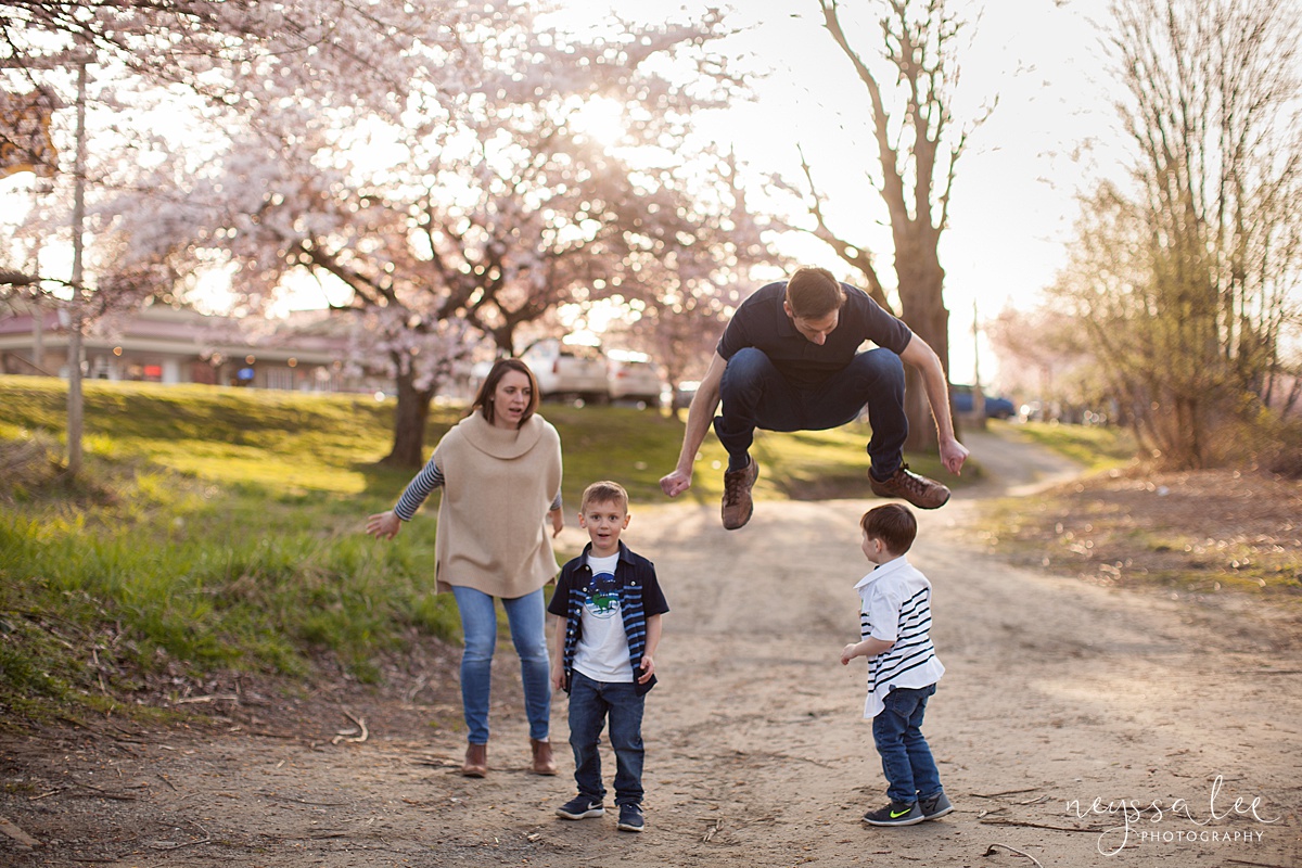Family Photos by the River at Sunset, Neyssa Lee Photography, Snoqualmie Family Photography, Family of Four, Dad jumps over sons head