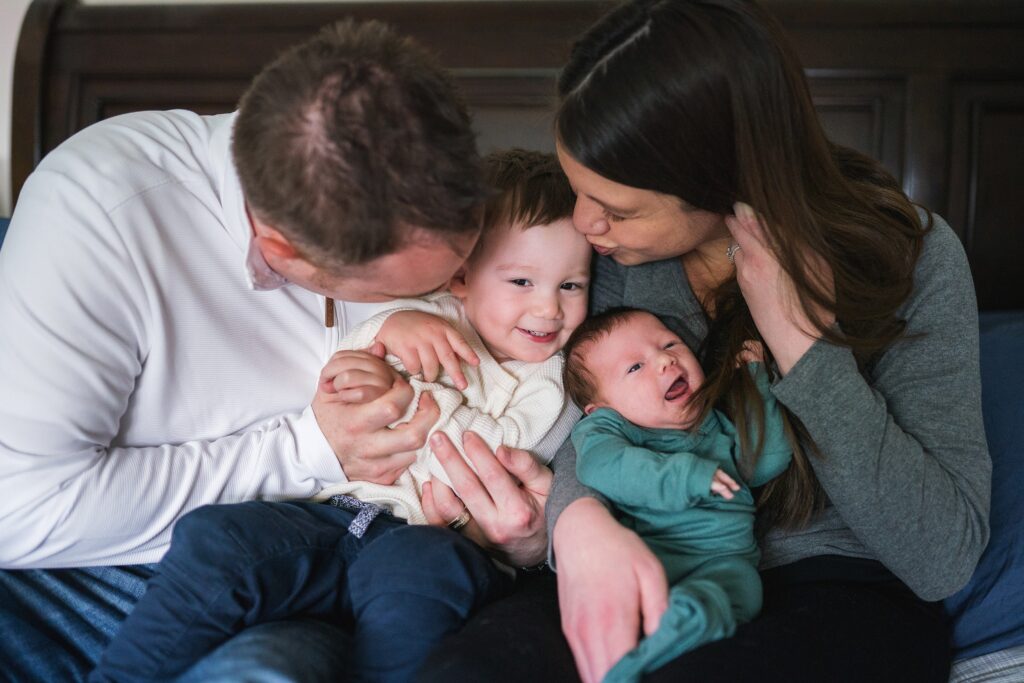 Family with toddler and baby girl during in home portrait session in Edmonds, WA