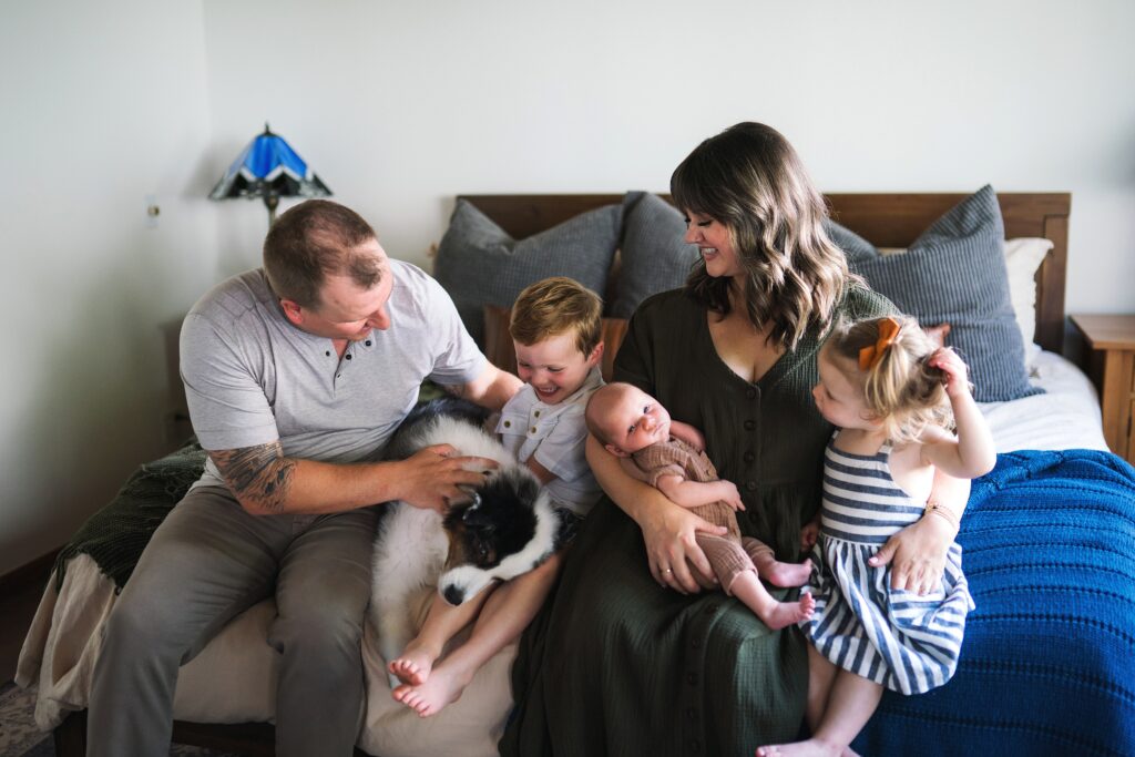 Family of five with puppy dog during Mercer Island Newborn photo session