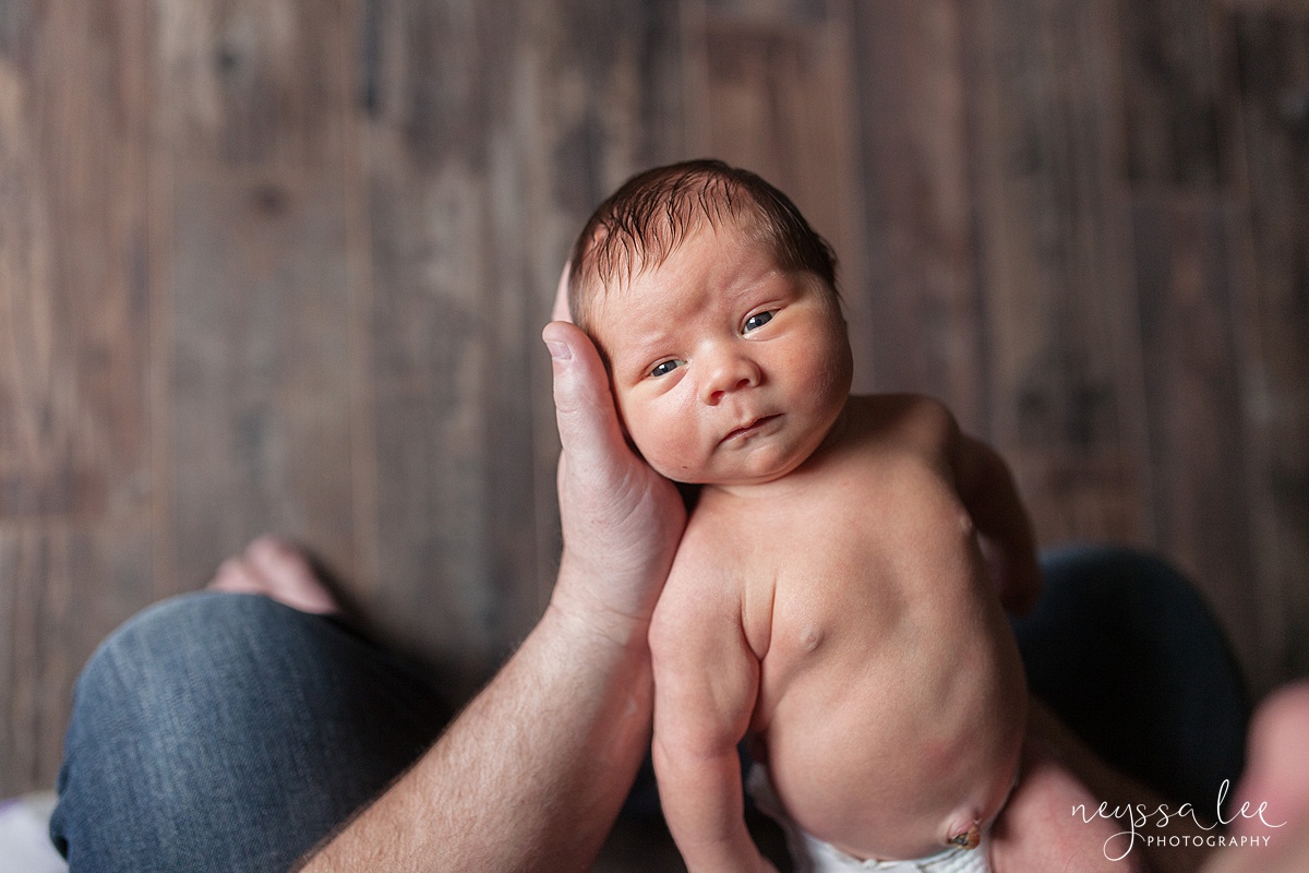Neyssa Lee Photography, Awake newborn baby boy, lifestyle newborn photography, Seattle newborn photographer, Baby in dads arms