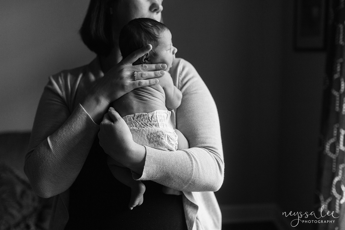 Mom and baby with natural window light, black and white baby photo