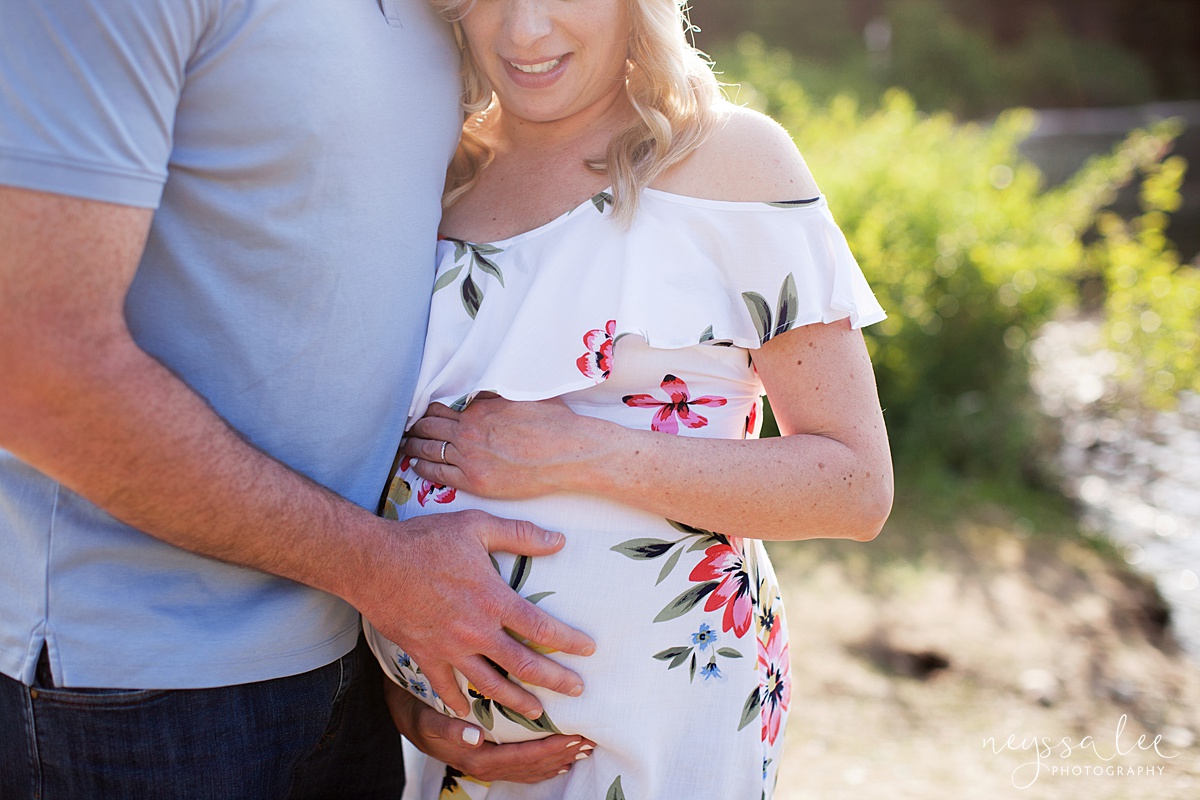 Couple maternity photo at Gold Creek Pond