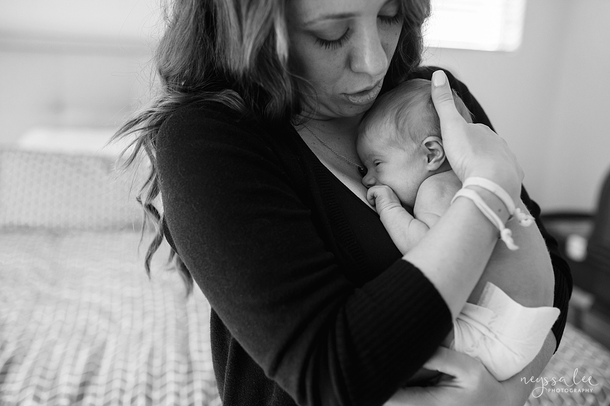 Snoqualmie newborn photographer, Neyssa Lee Photography, Seattle Newborn Photography, Newborn snuggled in moms arms, lifestyle newborn photography
