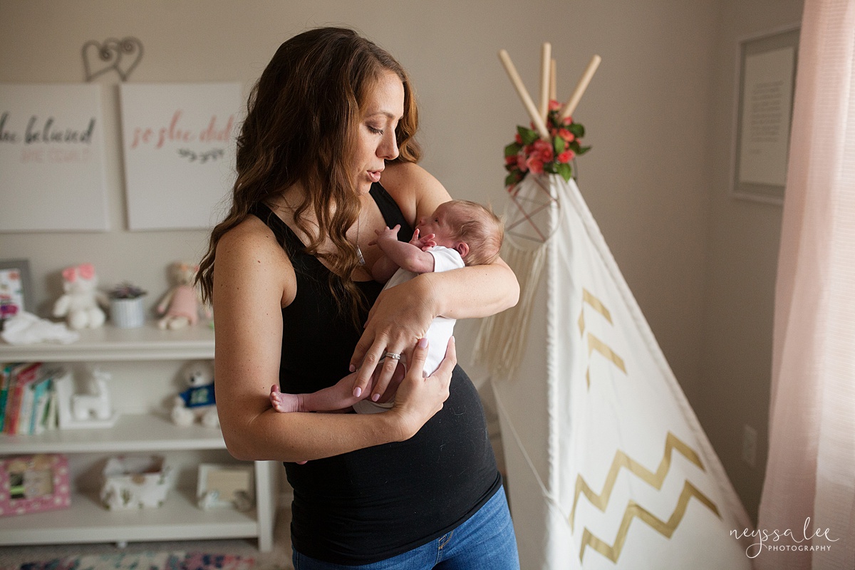 Snoqualmie newborn photographer, Neyssa Lee Photography, Seattle Newborn Photography, mother holding baby in nursery