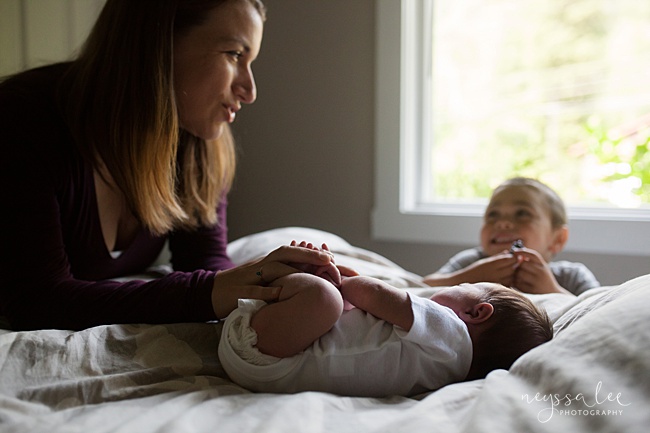 Seattle Newborn Photography, Neyssa Lee Photography, Snoqualmie photographer, mom with her boys on big bed