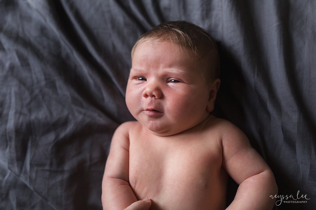 Seattle newborn photographer, Neyssa Lee Photography, Lifestyle Newborn Photography, photo of newborn baby looking at the camera
