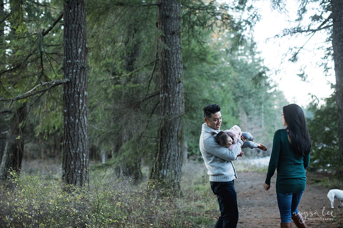 Neyssa Lee Photography, Seattle Lifestyle Family Photographer, Playful photo of family of three on a wooded trail