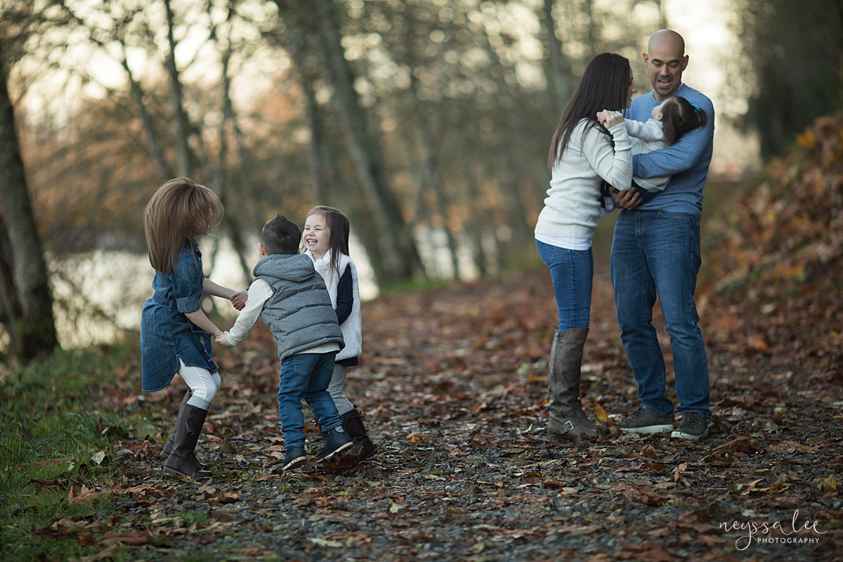 Neyssa Lee Photography, Snoqualmie Family Photographer, Large family photo, Lifestyle photo of siblings playing together with parents in background