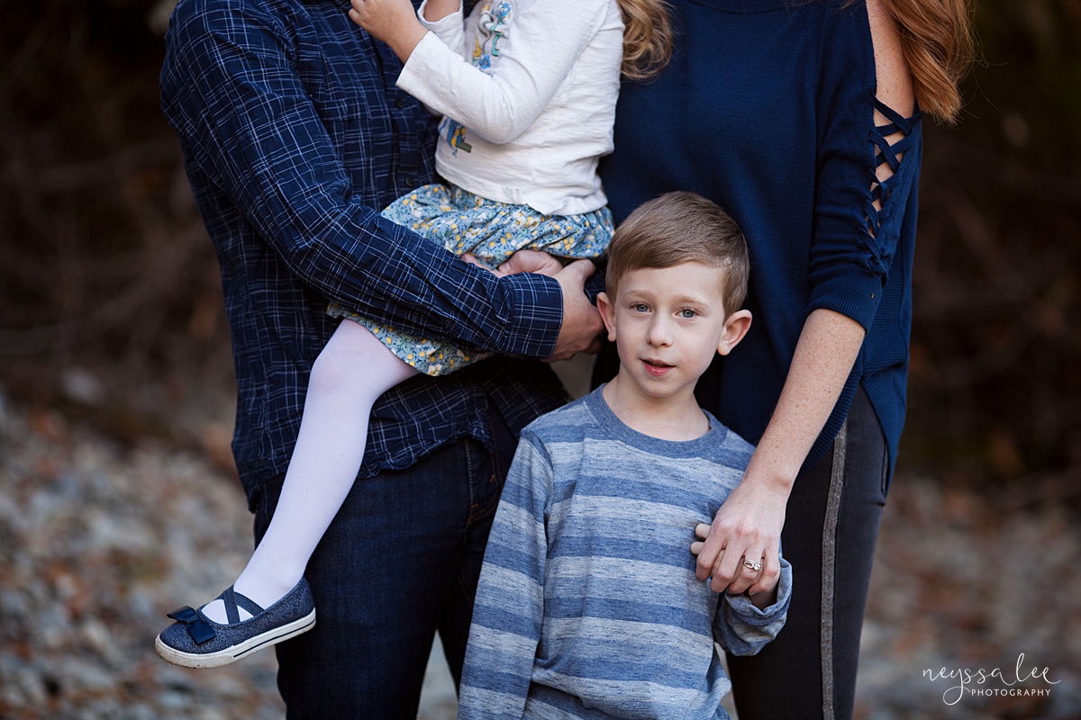 Neyssa Lee Photography, lifestyle family photography, Seattle Family Photographer, Photo of boy smiling surrounded by family