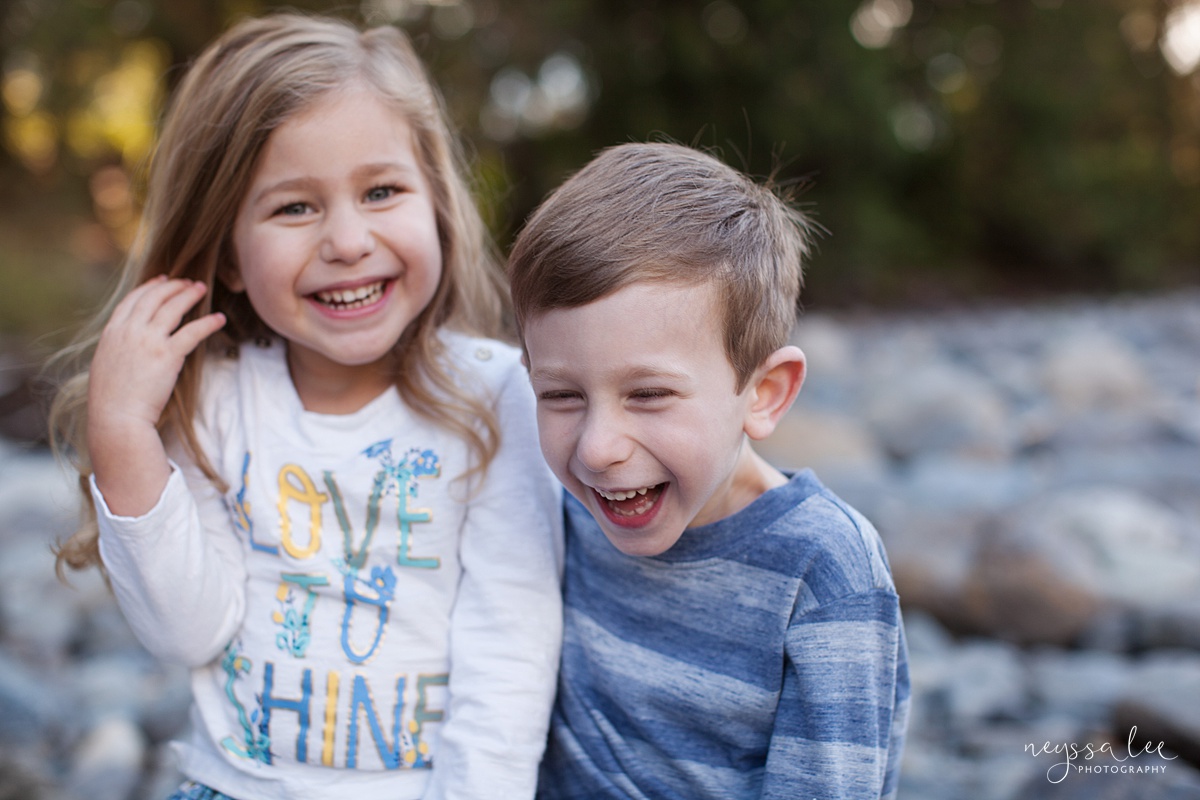 Neyssa Lee Photography, lifestyle family photography, Seattle Family Photographer, Photo of brother and sister laughing together, relaxed sibling photo