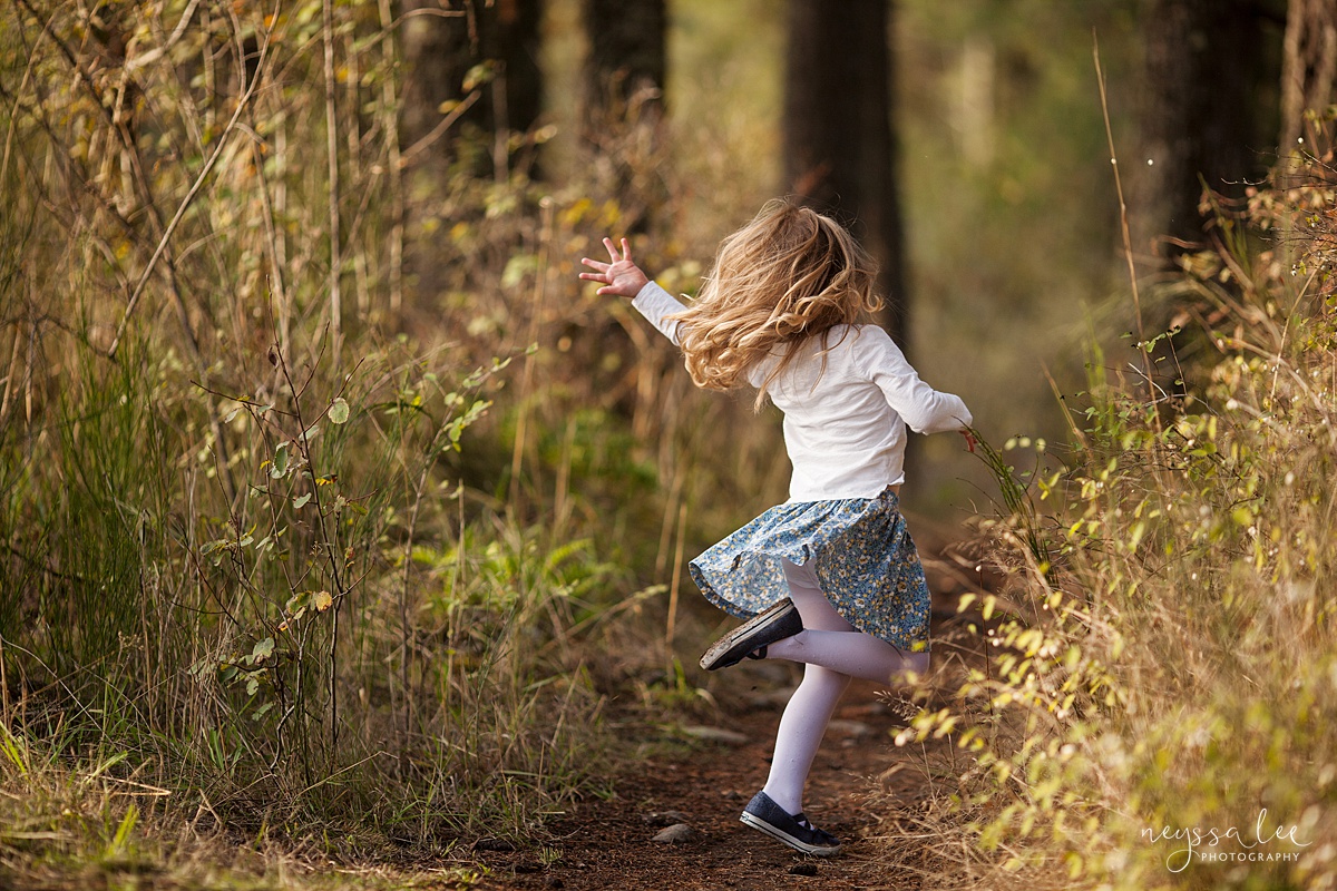 Neyssa Lee Photography, lifestyle family photography, Seattle Family Photographer, Photo of girl twirling in field