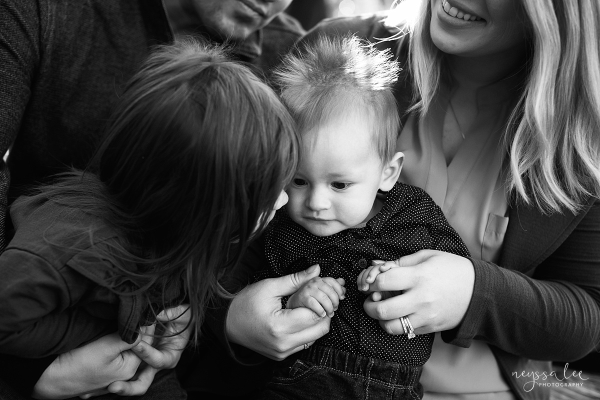 Uncooperative Kids During Family Photos, Neyssa Lee Photography, Seattle Family Photographer, Issaquah Photography, Black and white photo of big sister kissing baby brother