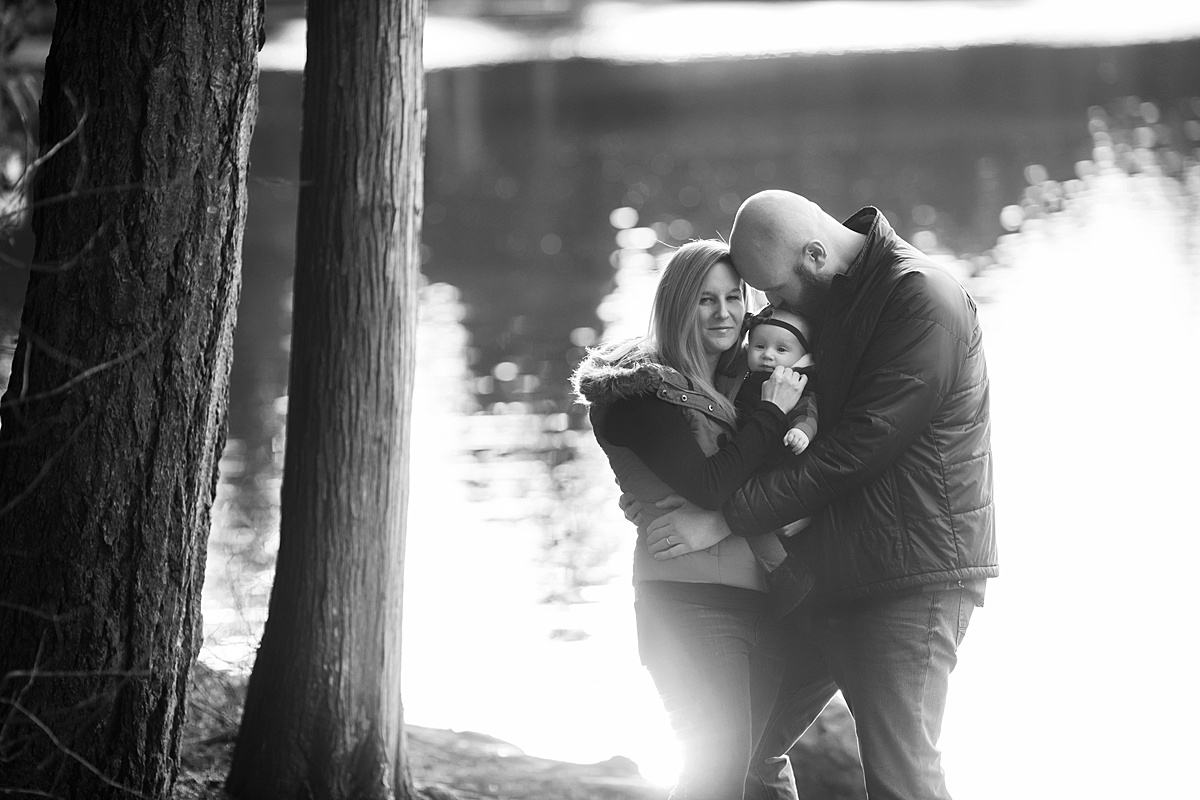 Best Age to Photograph Baby, Neyssa Lee Photography, Seattle Baby Photographer, Black and white photo of family by the lake