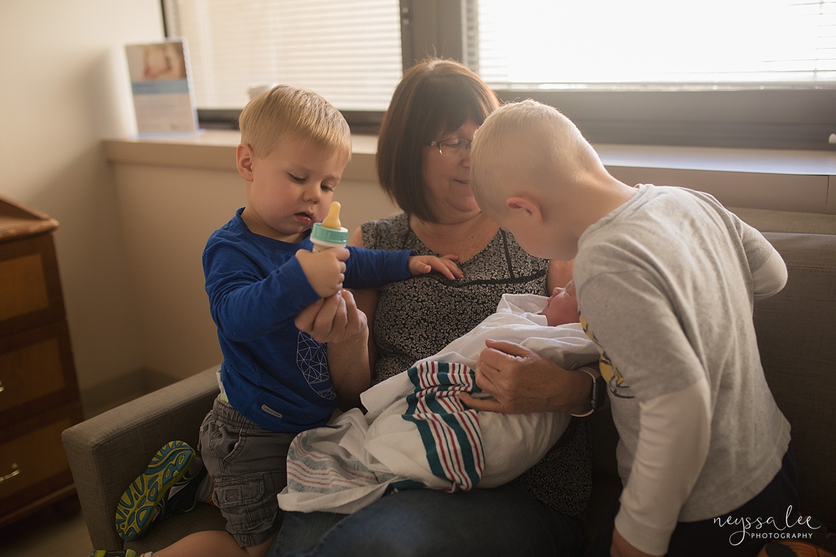 Neyssa Lee Photography, Issaquah and Bellevue Fresh 48 Photographer,  Photo of big brothers examining baby sister 