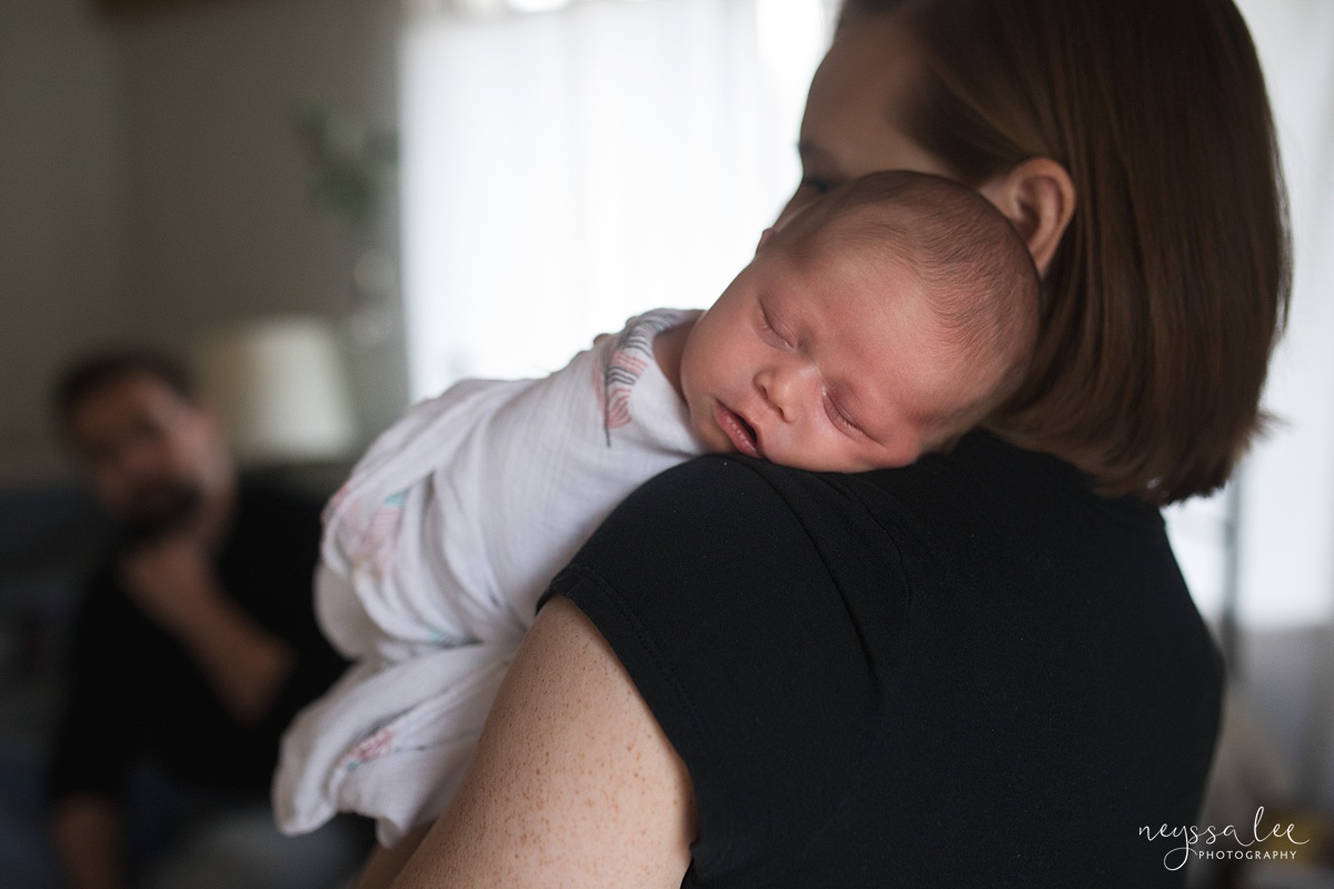 Neyssa Lee Photography, Seattle Newborn Photographer,  Newborn Photo Session Experience, Photo of newborn baby girl on moms shoulders