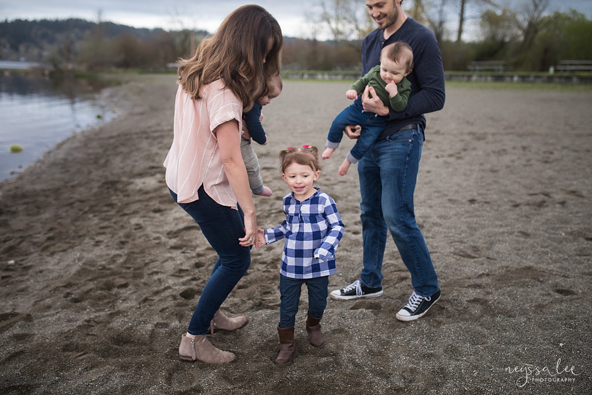 Neyssa Lee Photography, Issaquah Family Photographer, Family Photos with Grey Skies, Lake Sammamish State Park, Photo of family dancing together on the beach