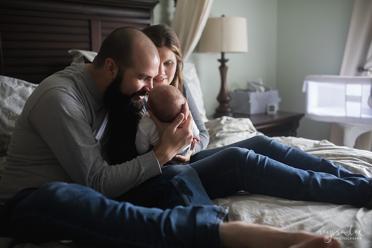 Dad and baby noses touch 