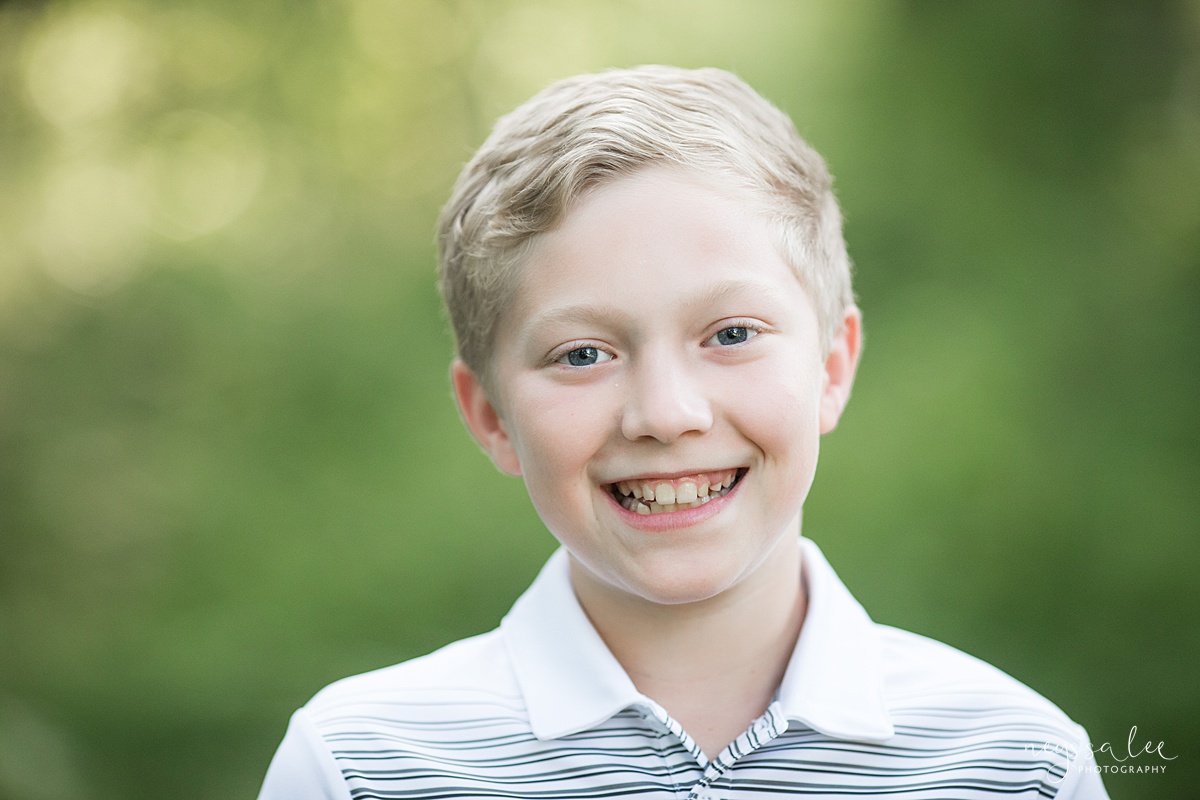 Portrait of a boy smiling.