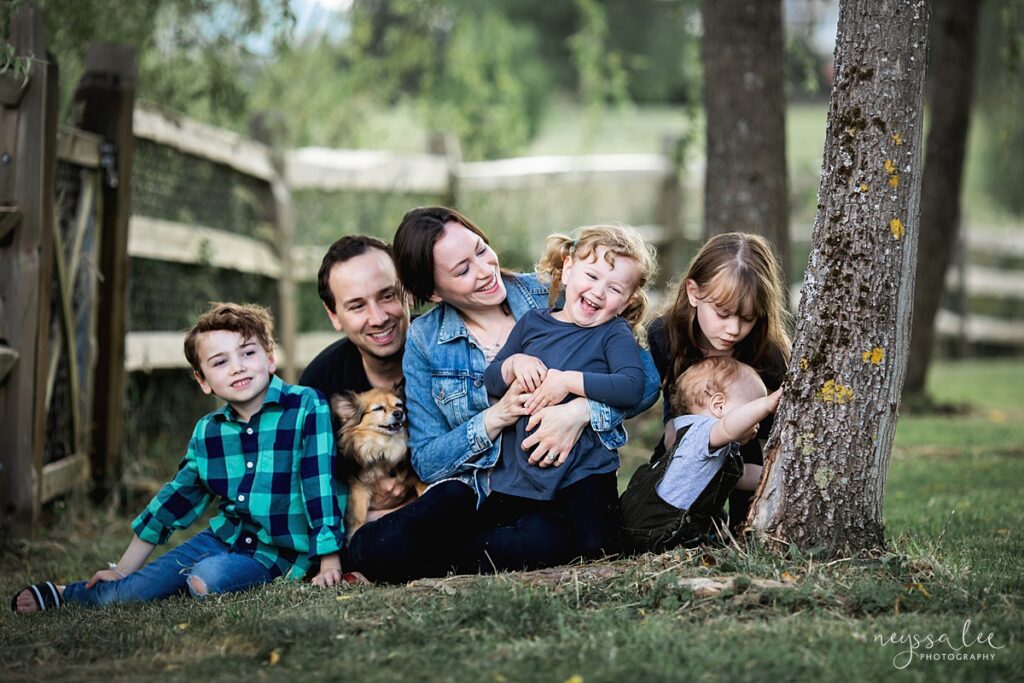 Family of five in greens for portraits in the Snoqualmie Valley