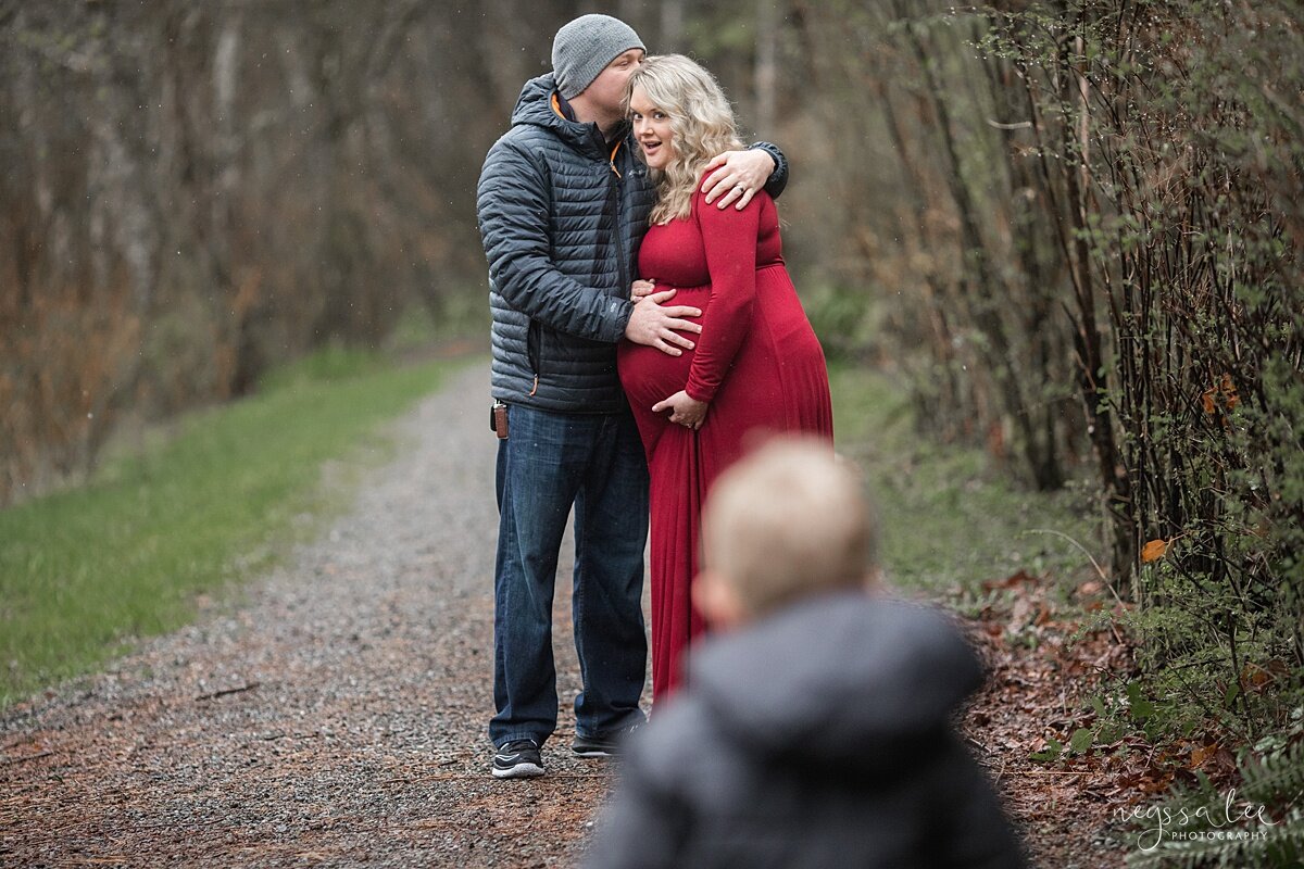 Beautiful Maternity Photos in the Rain, Neyssa Lee Photography, Issaquah maternity photographer,  Maternity photo of husband and wife with boy running towards them