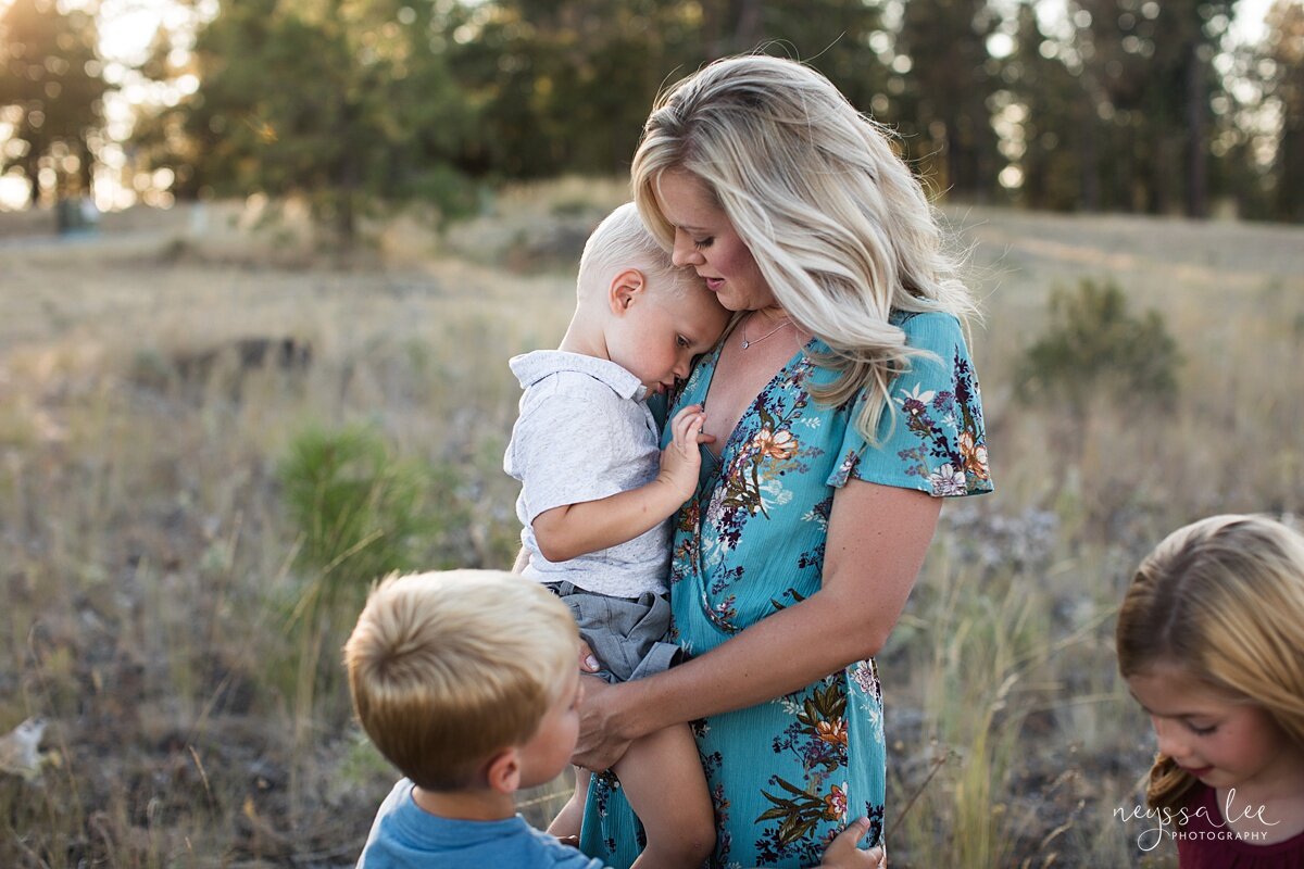 Benefits of family photos on vacation, Neyssa Lee Photography, Chelan Family Photographer, Photo of mother consoling her son
