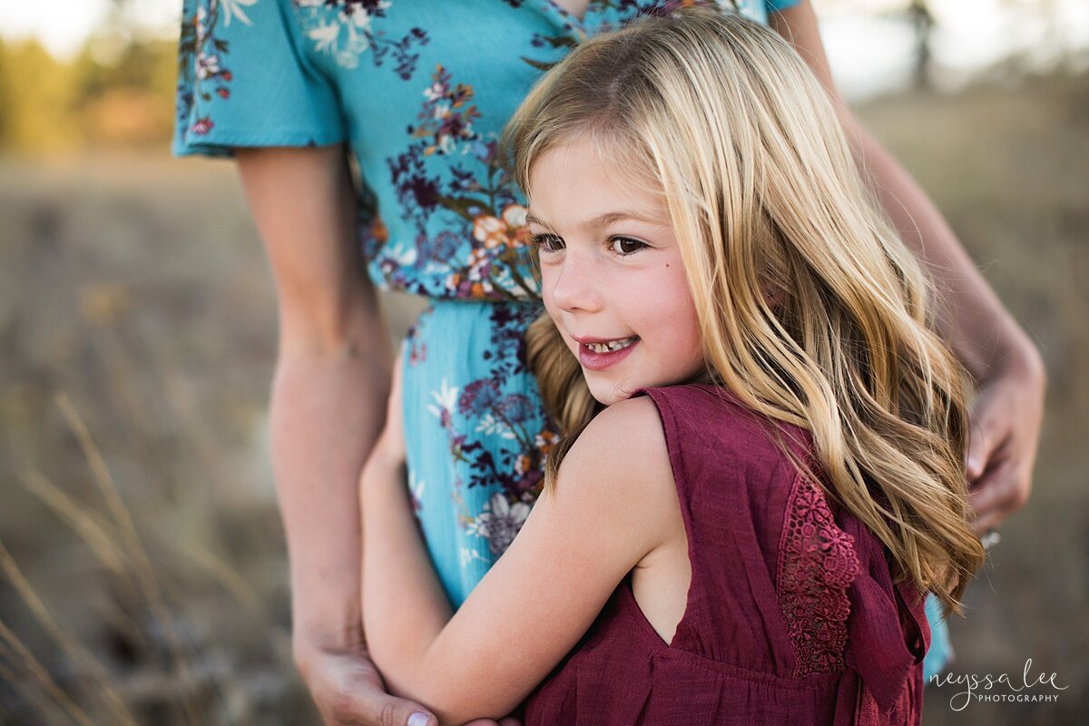 Benefits of family photos on vacation, Neyssa Lee Photography, Chelan Family Photographer, Portrait of a girl hugging her mom