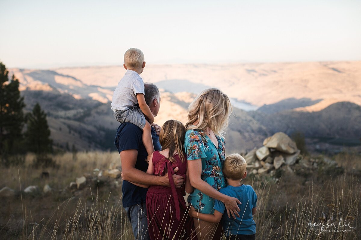 Benefits of family photos on vacation, Neyssa Lee Photography, Chelan Family Photographer, Photo of family overlooking a beautiful valley