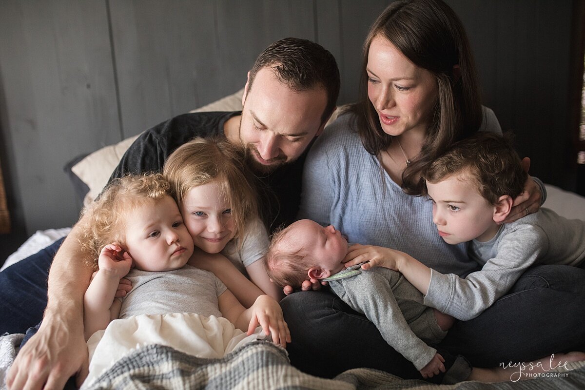 Number One thing you can do for beautiful newborn photos, Issaquah newborn photographer, Neyssa Lee Photography, Lifestyle newborn photo of family loving on baby brother