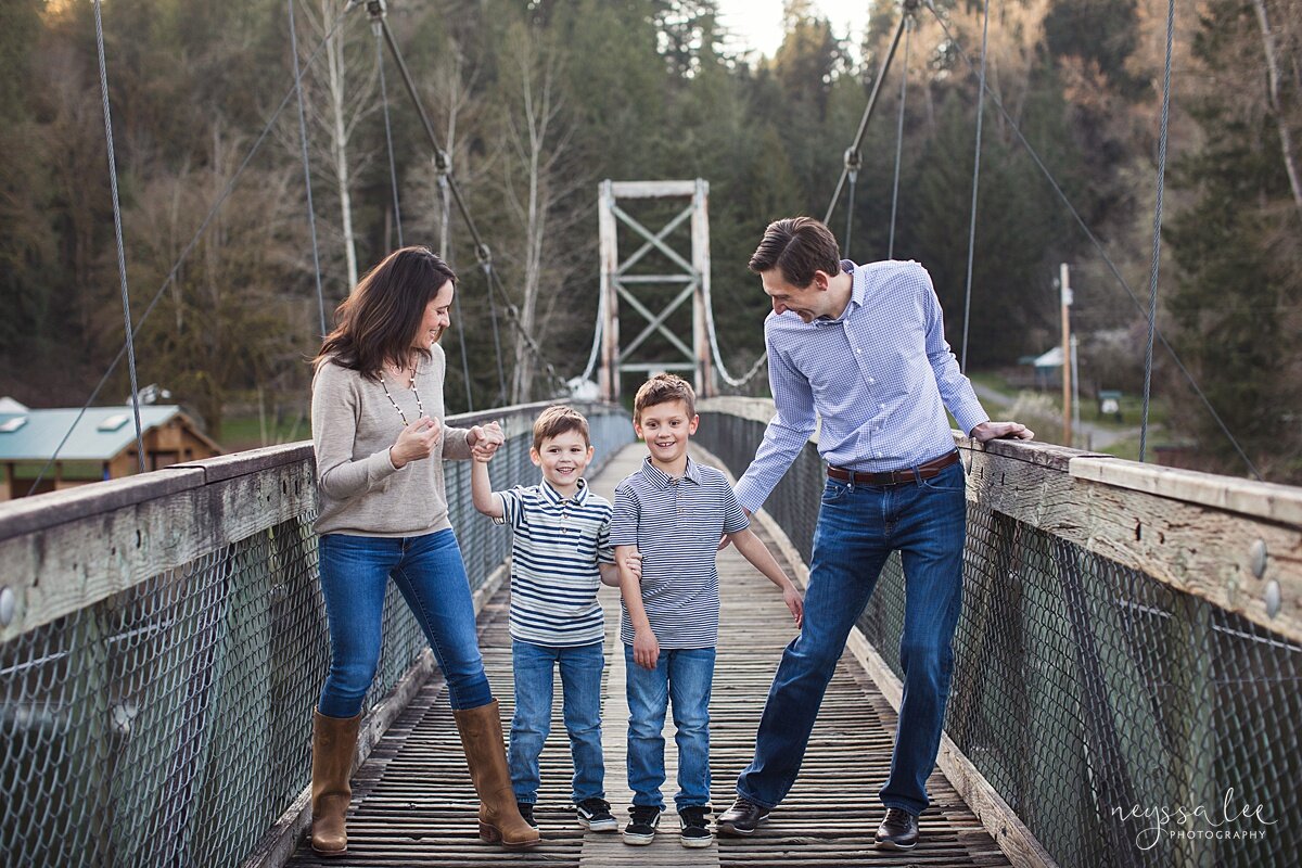 Family Photo Session with Social Distancing, Neyssa Lee Photography, Seattle Family Photographer, Lifestyle family photo of family dancing on a bridge