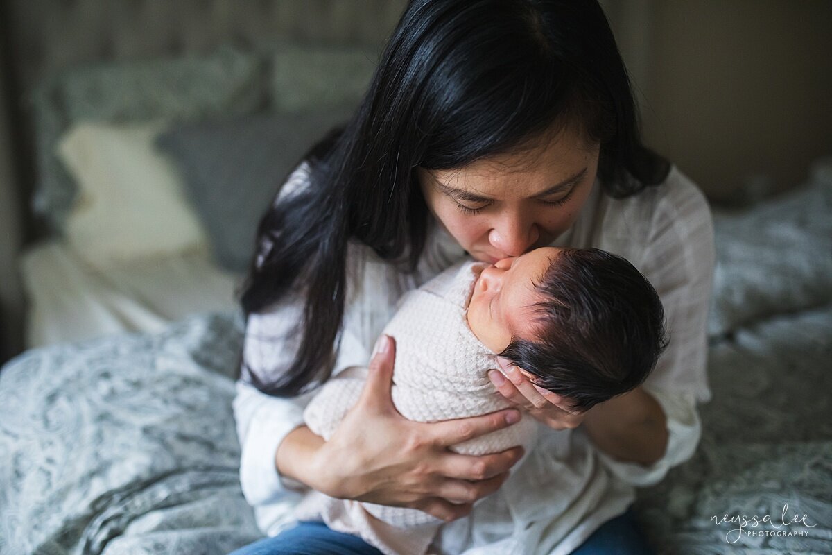 How to prepare for newborn photos, Neyssa Lee Photography, Seattle newborn photographer, Team Green Tips, Photo of mom kissing newborn baby