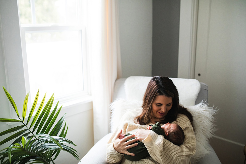 Seattle newborn photography, mother and baby by window