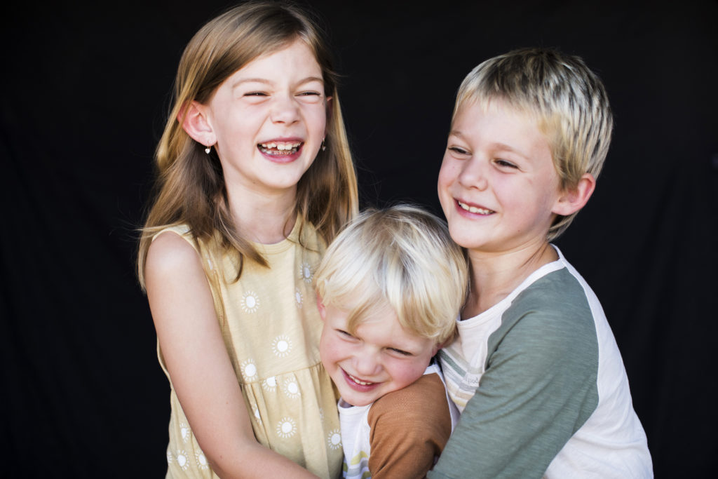 Sibling Pictures, Three kids laughing together during Seattle photoshoot