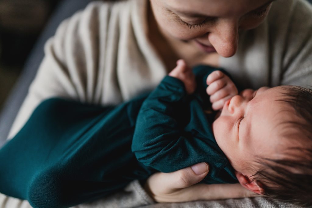 newborn photos, photo of mother with baby boy