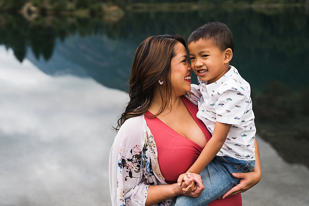 mother and son showing favorite maternity pose together during Snoqualmie pass maternity photo session