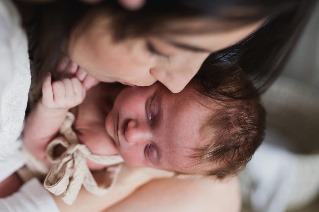 mother loving on baby  during Seattle newborn photos