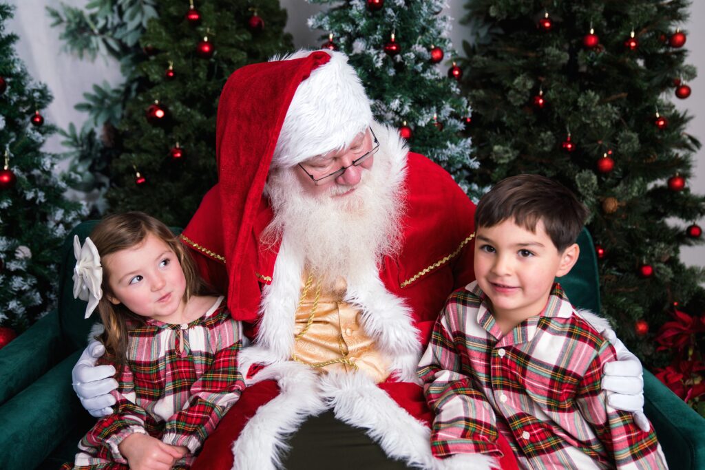 Boy and girl in PJs for Santa photos in North Bend, Wa